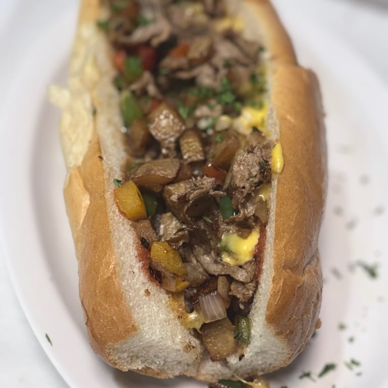Indulge in Our Cheesesteak